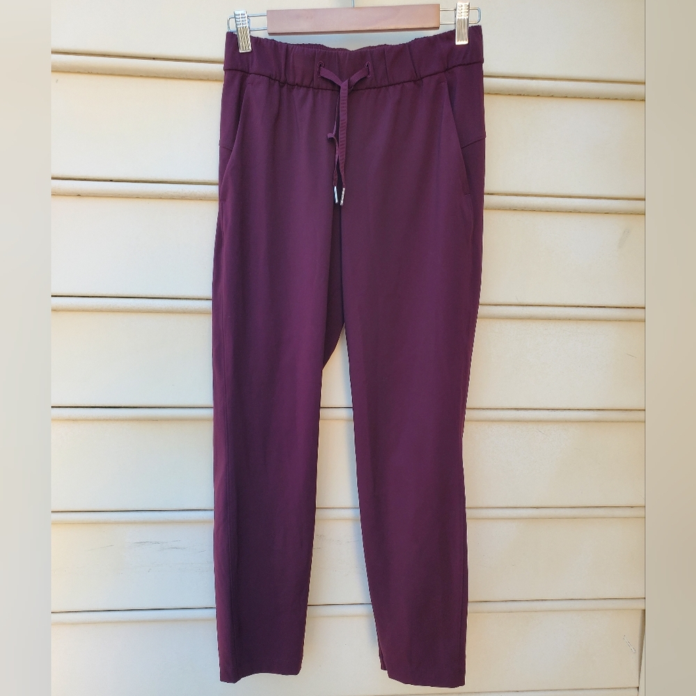 Lululemon On the Fly 7/8 Pant Dark Adobe  Size 4
